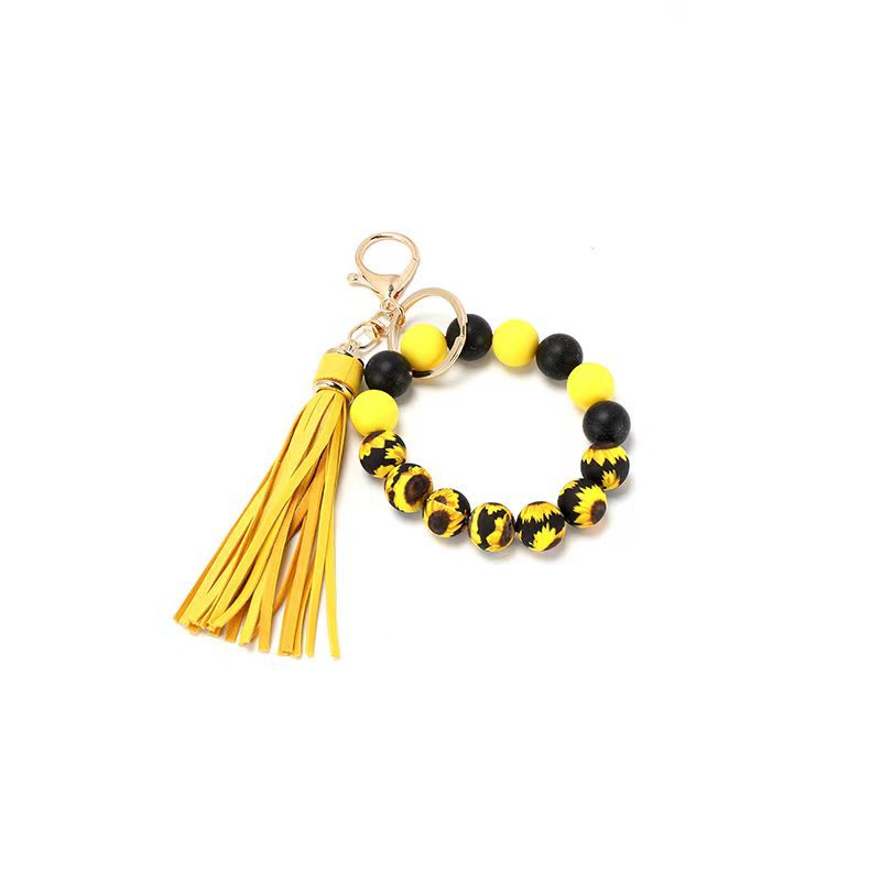 Wholesale Silicone Food Grade Cartoon Tassel Printed Silicone Wrist Keychain